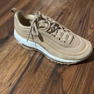 Nike air max 97 women’s size 7.5 US. Color is sparkly gold. USED